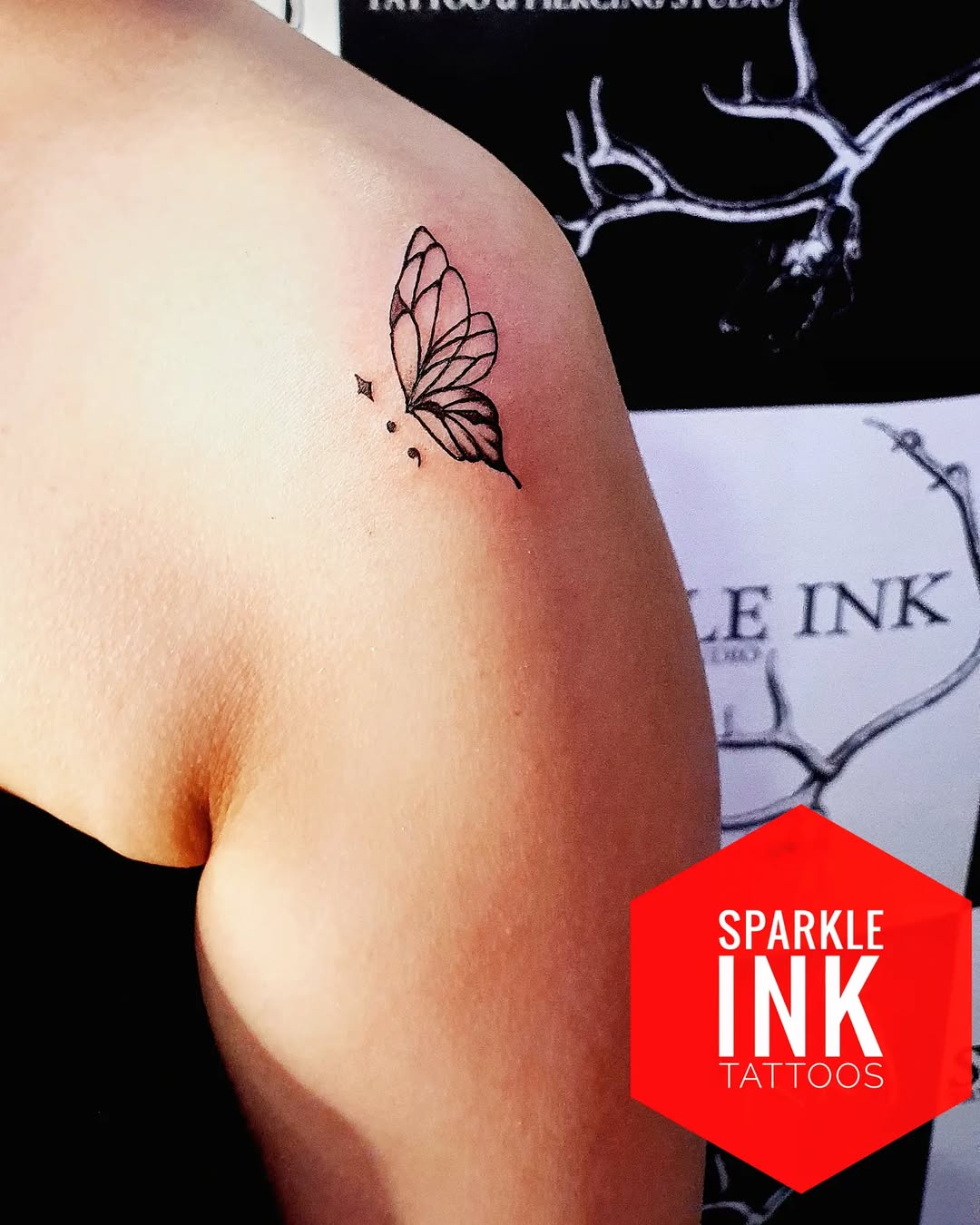 Zavia with arm butterfly tattoo